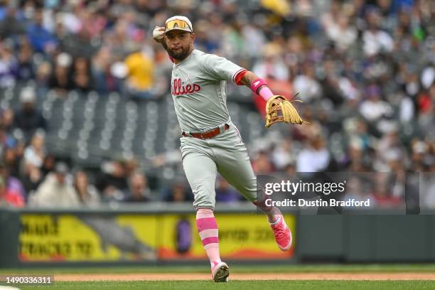 Edmundo Sosa of the Philadelphia Phillies throws to first base after fielding a ground ball in the fourth inning of a game against the Colorado...