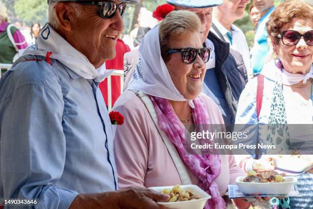 Free distribution of cocido madrileño stew at the Pradera de San Isidro, on 15 May, 2023 in Madrid, Spain. The distribution of cocido, one of the...