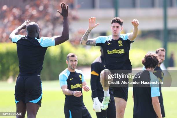 Alessandro Bastoni of FC Internazionale interacts with teammates during a training session ahead of their UEFA Champions League semi-final second leg...