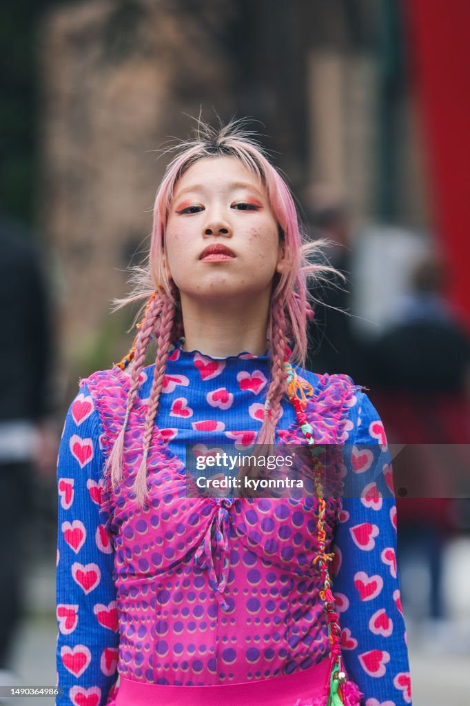 Portrait of Teenage girl with pink hair