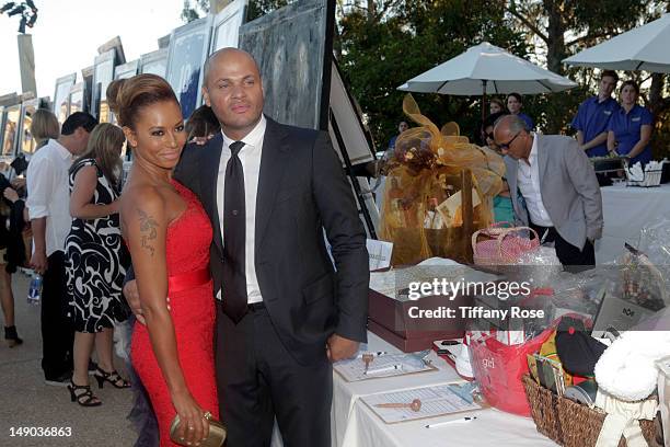 Recording artist Melanie 'Mel B' Brown and producer Stephen Belafonte attend the HollyRod Foundation's 14th Annual Design Care on July 21, 2012 in...