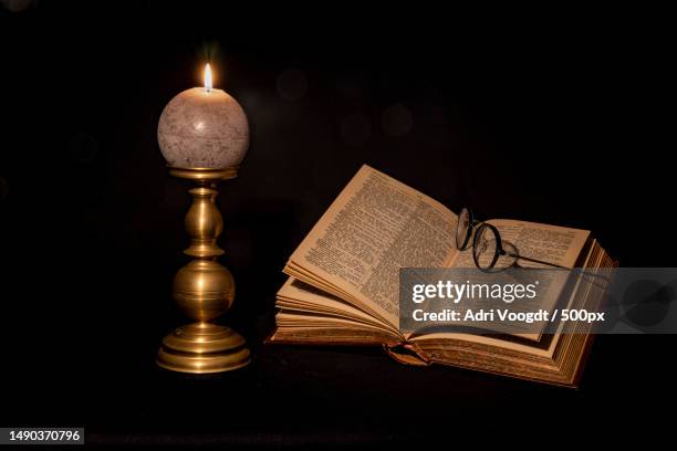 still life,hoofdplaat,netherlands - open bible on table stock pictures, royalty-free photos & images