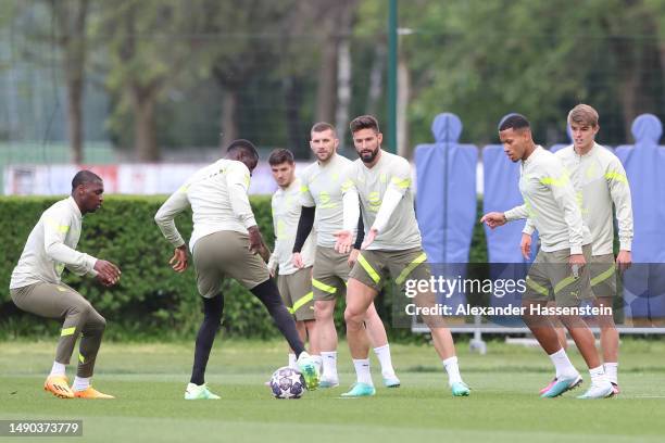 Olivier Giroud of AC Milan and teammates participate in a training session ahead of their UEFA Champions League semi-final second leg match against...