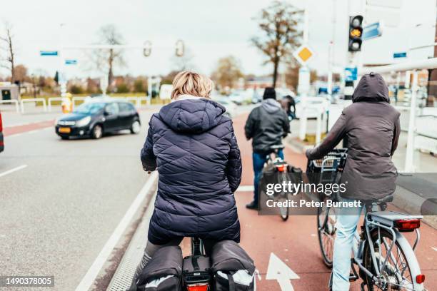 cycling in the netherlands - road signal stock pictures, royalty-free photos & images