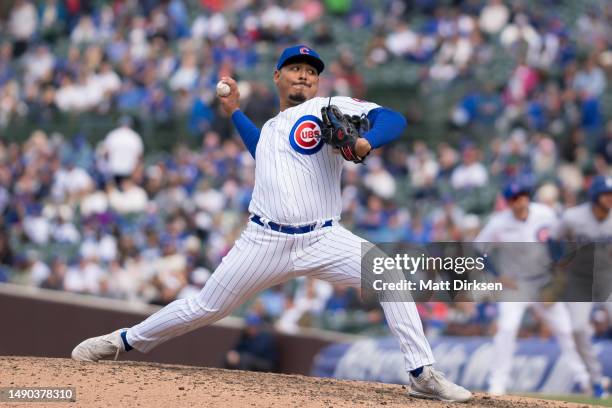 Jeremiah Estrada of the Chicago Cubs pitches in a game against the Los Angeles Dodgers at Wrigley Field on April 21, 2023 in Chicago, Illinois.