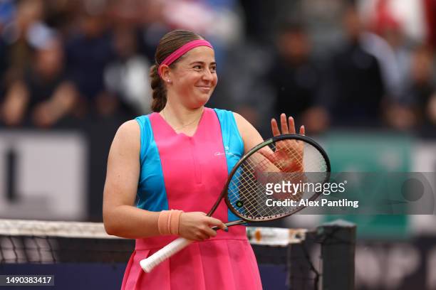 Jelena Ostapenko of Latvia celebrates match point in her women's singles quarter-final match against Daria Kasatkina during day eight of the...