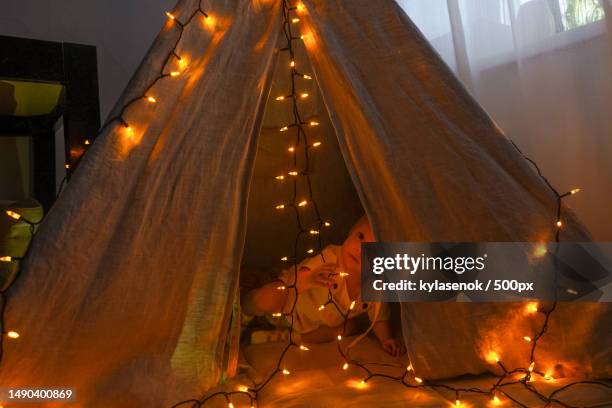 magic tent with garland home,girl inside,russia - homegirl stock pictures, royalty-free photos & images