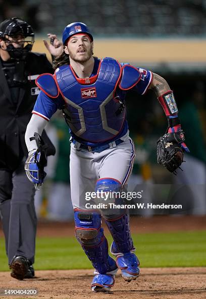 Texas Ranger Heim Jonah Heim of the Texas Rangers tracks a foul pop-up against the ...