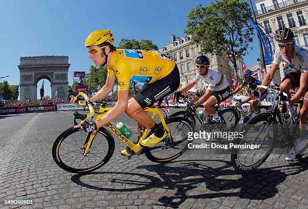Bradley Wiggins of SKY Procycling rounds the arc d'triomphe during the twentieth and final stage of the 2012 Tour de France, from Rambouillet to the...