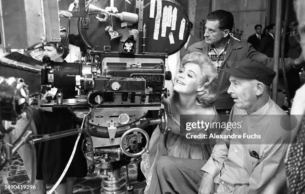 Actress Sandra Dee pics through the camera at the set of the film 'Come September' rome, Italy.