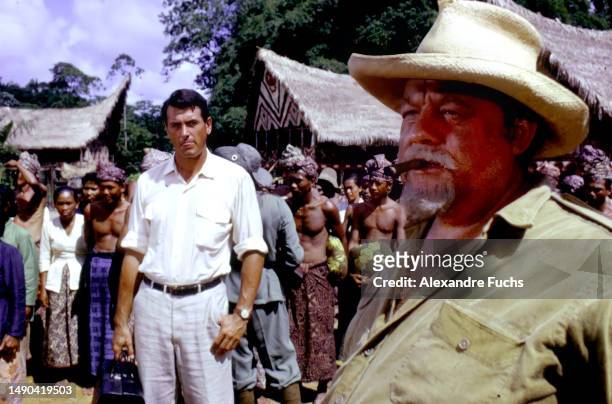 Actors Rock Hudson and Burl Ives in a scene of the film "The Spiral Road" in 1961, at Paramaribo in Suriname.