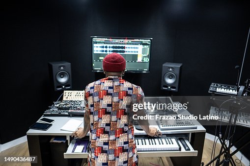 Producer man analyzing the recording in the a recording studio