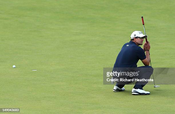 Adam Scott of Australia reacts to a missed par putt on the 18th green during the final round of the 141st Open Championship at Royal Lytham & St....