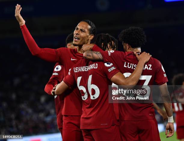 Trent Alexander-Arnold of Liverpool celebrates after scoring the third goal during the Premier League match between Leicester City and Liverpool FC...