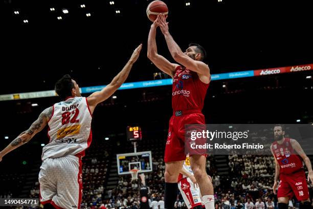 Carlos Delfino of Carpegna Prosciutto Pesaro and Giampaolo Ricci of EA7 Emporio Armani Milan during Game Two of the Quarterfinals of LBA Lega Basket...