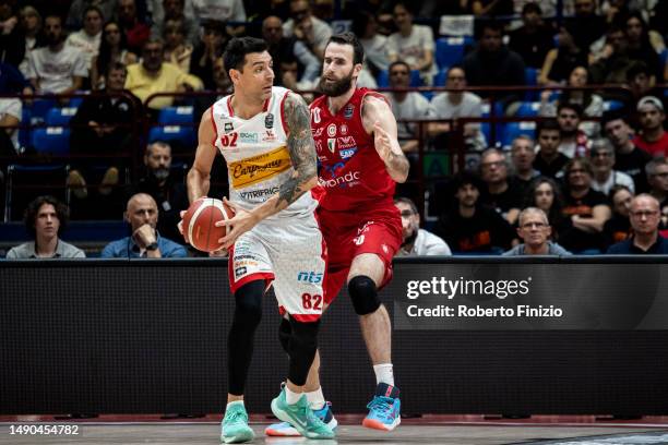 Carlos Delfino of Carpegna Prosciutto Pesaro and Luigi Datome of EA7 Emporio Armani Milan during Game Two of the Quarterfinals of LBA Lega Basket...