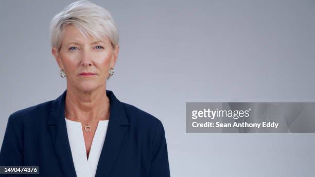 senior business woman, confidence in portrait and executive with pride isolated on studio background. serious professional female, corporate career mindset and ceo of company with mockup space - assertiveness stock pictures, royalty-free photos & images