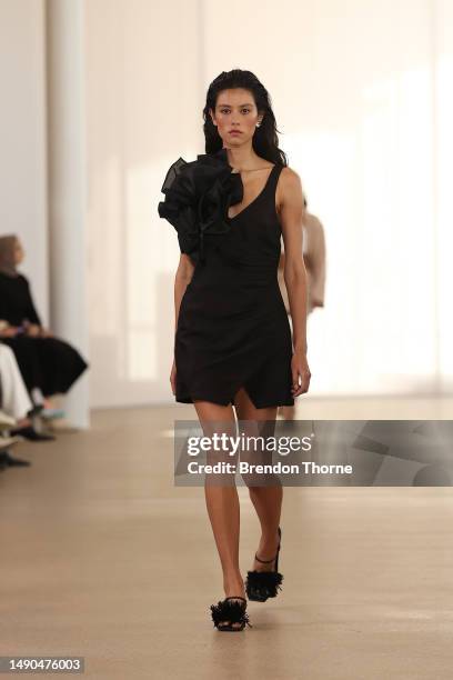 Model walks the runway during the Aje show during Afterpay Australian Fashion Week 2023 at the Sydney Modern Project on May 16, 2023 in Sydney,...