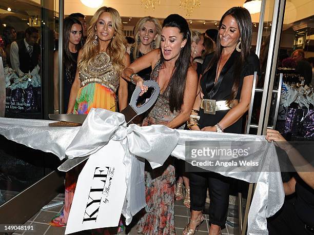 Designer Faye Resnick, TV peronality Kyle Richards and boutique owner Lizzy Schwartz attend the pre-opening cocktail party of Kyle Richards' new...