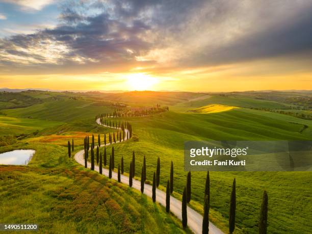 asciano crete senesi rolling landscape in tuscany - farmhouse stock pictures, royalty-free photos & images