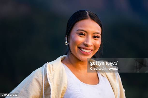 finding her peace - american indian woman stock pictures, royalty-free photos & images