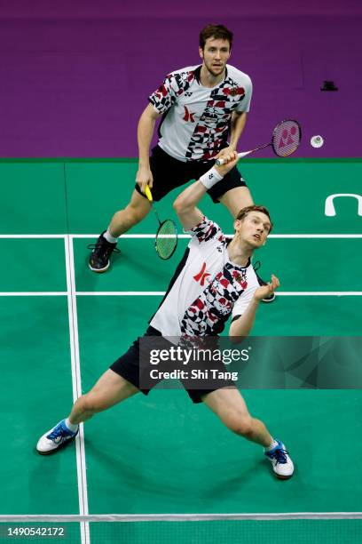 Mark Lamsfuss and Marvin Seidel of Germany compete in the Men's Doubles Round Robin match against Leo Rolly Carnando and Daniel Marthin of Indonesia...