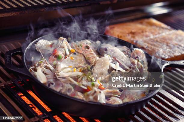 salmon shrimp and caviar on the grill for a glamorous meal - trout stock pictures, royalty-free photos & images