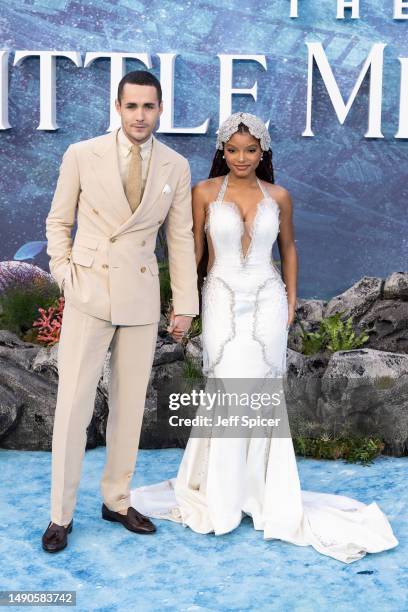 Jonah Hauer-King and Halle Bailey attend the UK Premiere of "The Little Mermaid" at Odeon Luxe Leicester Square on May 15, 2023 in London, England.