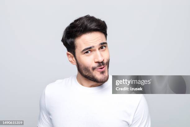 headshot of surprised young man - man excited face stock pictures, royalty-free photos & images