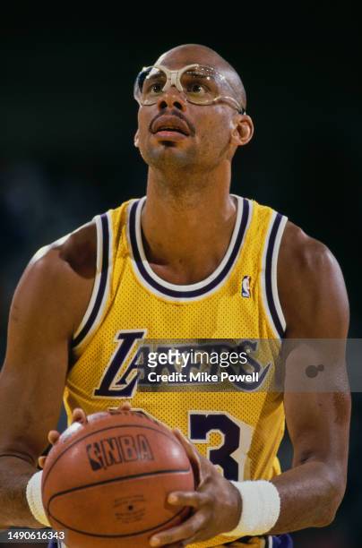 Kareem Abdul-Jabbar, Center for the Los Angeles Lakers prepares to shoot a free throw during the NBA Pacific Division basketball game against the...