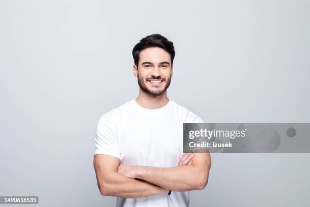 portrait of pleased young man - trainer cutout stockfoto's en -beelden