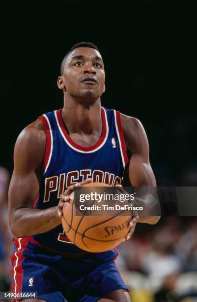 Isiah Thomas, Point Guard for the Detroit Pistons prepares to shoot a free throw during the NBA Midwest Division basketball game against the Denver...