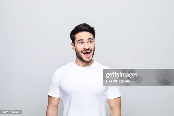 portrait of surprised young man - teacher shouting stock pictures, royalty-free photos & images