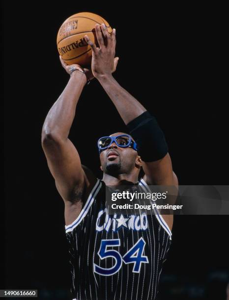 Horace Grant, Power Forward and Center for the Orlando Magic prepares to shoot a free throw during the NBA Atlantic Division basketball game against...