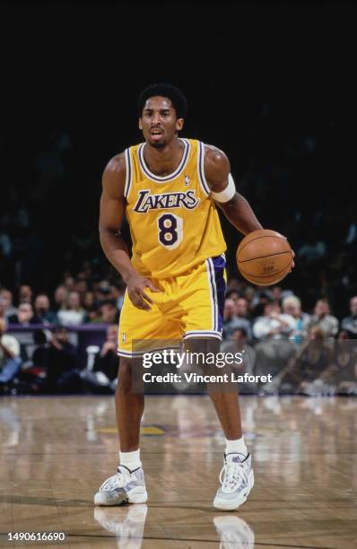 Kobe Bryant, Shooting Guard and Small Forward for the Los Angeles Lakers dribbles the basketball down court during the NBA Pacific Division...