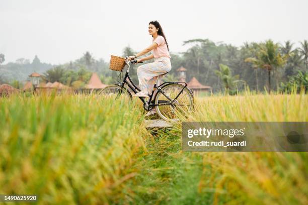 have fun by bike in the village - bali stock pictures, royalty-free photos & images