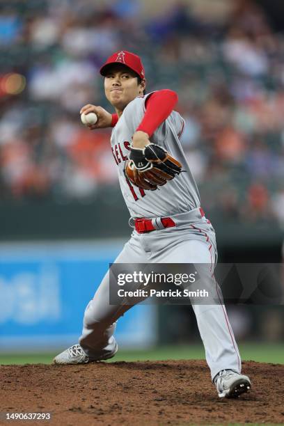 Starting pitcher Shohei Ohtani of the Los Angeles Angels pitches in the fourth inning against the Baltimore Orioles at Oriole Park at Camden Yards on...
