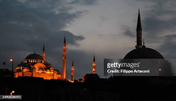 mosques in istanbul at evening - islamabad stock pictures, royalty-free photos & images