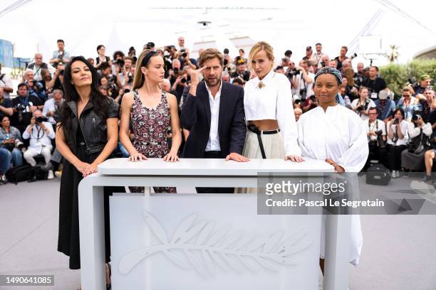 Maryam Touzani, Brie Larson, Ruben Östlund, Julia Ducournau and Rungano Nyoni attend the jury photocall at the 76th annual Cannes film festival at...