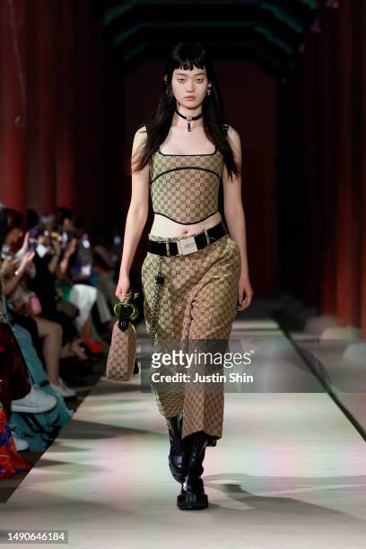 Model walks the runway during the Gucci Seoul Cruise 2024 fashion show at Gyeongbokgung Palace on May 16, 2023 in Seoul, South Korea.