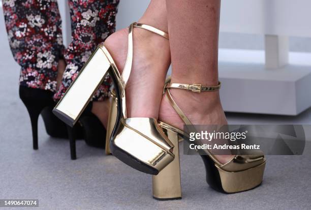 Jury member Julia Ducournau, shoe detail, attends the jury photocall at the 76th annual Cannes film festival at Palais des Festivals on May 16, 2023...