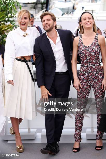 Julia Ducournau, President of the Jury of the 76th Cannes Film Festival Ruben Ostlund and Brie Larson attend the jury photocall at the 76th annual...