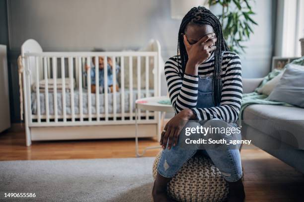 mother having problems with her baby boy - women crying stock pictures, royalty-free photos & images
