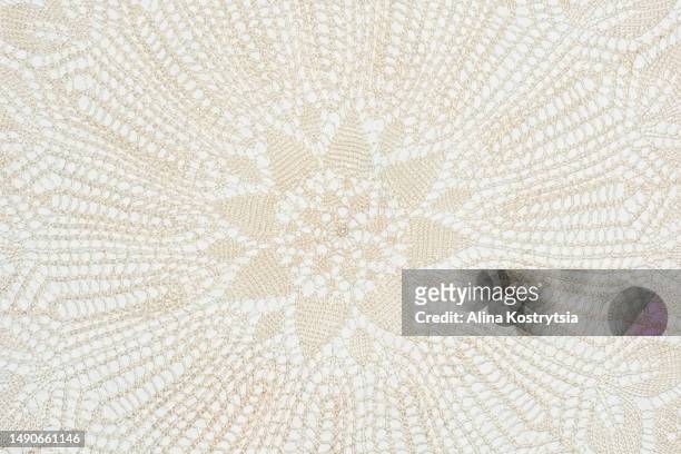 texture of beautiful beige gray lace fabric close-up. - lace textile stock pictures, royalty-free photos & images