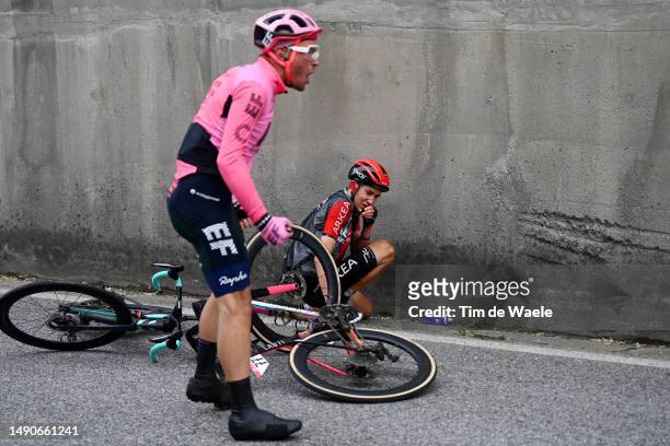Alberto Bettiol of Italy and Team EF Education-EasyPost and Michel Ries of Luxembourg and Team Arkéa Samsic after being involved in a crash during...