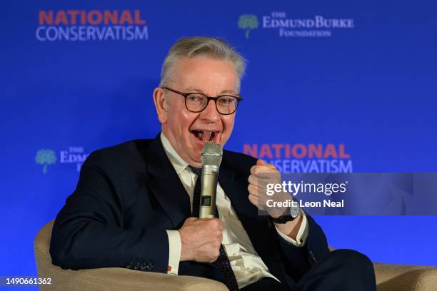 Michael Gove, Secretary of State for Levelling Up, Housing and Communities and Minister for Intergovernmental Relations, addresses delegates during...