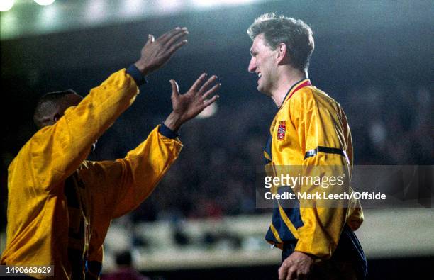 March 1994, London, UEFA European Cup Winners Cup - Arsenal v Torino - Tony Adams of Arsenal celebrates with Ian Wright after scoring the winning...