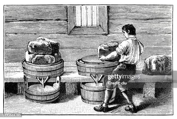 cheese dairy in the allgäu, man making the round cheese wheels - we made history stock illustrations