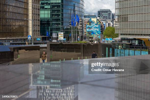 The famous graffiti mural painted by Belgian artist NovaDead, The Future is Europe, is seen among the buildings of the European institutions on the...