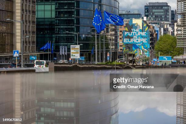 The famous graffiti mural painted by Belgian artist NovaDead, The Future is Europe, is seen among the buildings of the European institutions on the...